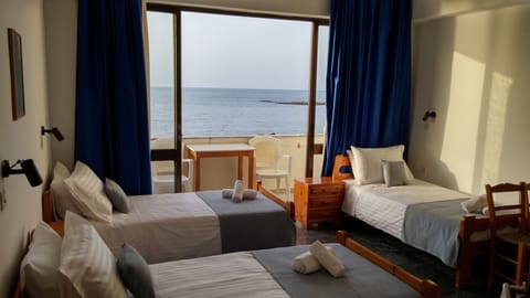 Triple Room, Sea View | Premium bedding, in-room safe, free WiFi, bed sheets