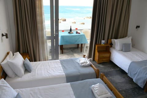 Triple Room, Sea View | Premium bedding, in-room safe, free WiFi, bed sheets