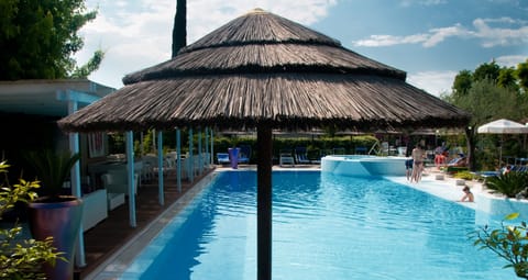 Indoor pool, seasonal outdoor pool, pool umbrellas, sun loungers