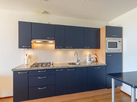 Comfort Apartment, 1 Bedroom | Private kitchen | Fridge, dishwasher, coffee/tea maker, electric kettle