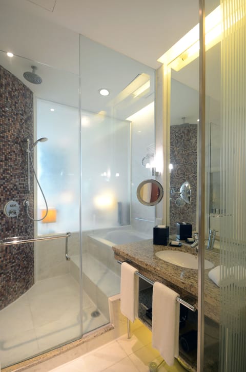 Separate tub and shower, deep soaking tub, designer toiletries