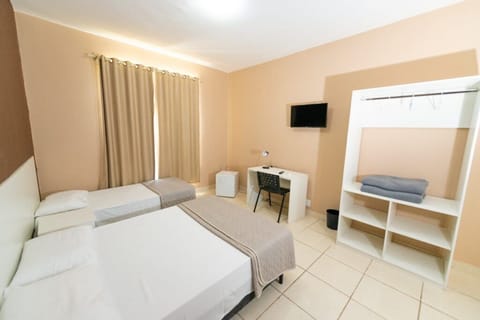 Deluxe Triple Room | Desk, laptop workspace, free WiFi