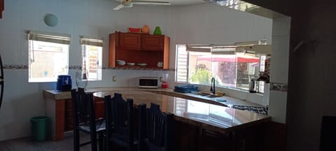 Family Bungalow | Private kitchen | Full-size fridge, oven, cookware/dishes/utensils