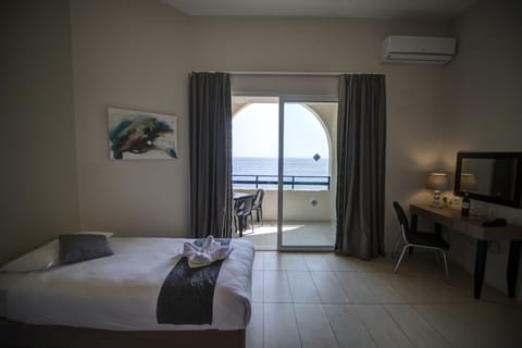 Double Room Single Use, Sea View | Desk, blackout drapes, iron/ironing board, free WiFi