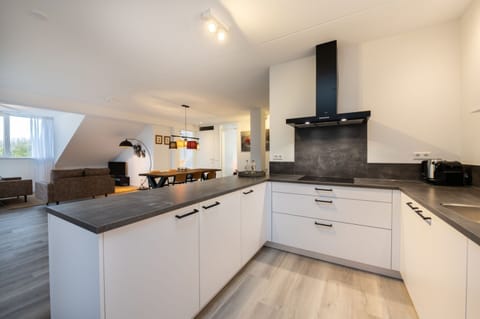 Elite Apartment, 2 Bedrooms | Private kitchen | Fridge, oven, dishwasher, coffee/tea maker