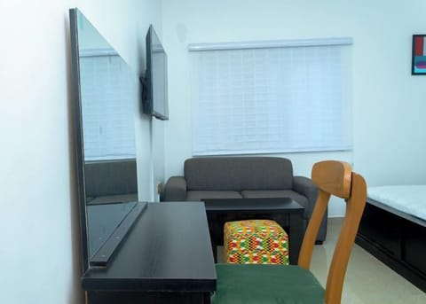 Family Room, Balcony, City View | Desk, laptop workspace, free WiFi