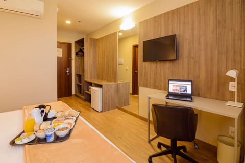 Superior Double Room | Minibar, in-room safe, desk, blackout drapes