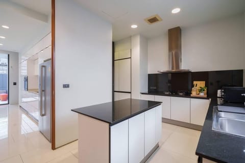 Villa | Private kitchen | Fridge, microwave, oven, stovetop