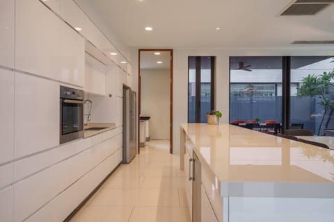 Villa | Private kitchen | Fridge, microwave, oven, stovetop