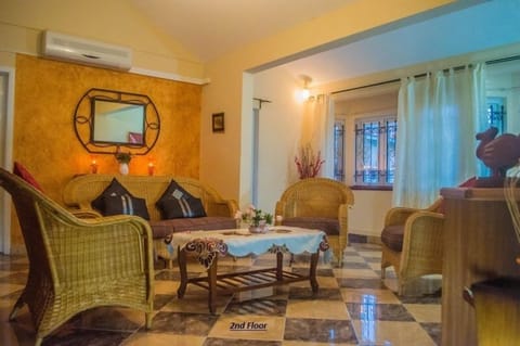 Deluxe Villa, Balcony, Pool View | Living area | 40-inch LCD TV with cable channels