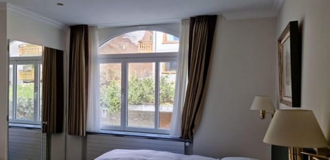 Superior Double Room, City View | Minibar, in-room safe, desk, free WiFi