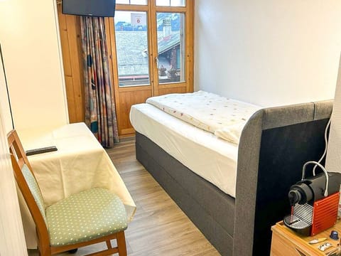 In-room safe, free WiFi, bed sheets, alarm clocks