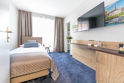 Deluxe Single Room | In-room safe, individually furnished, desk, iron/ironing board