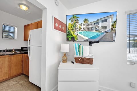 Panoramic Studio, Pool View | Living area | 45-inch Smart TV with cable channels