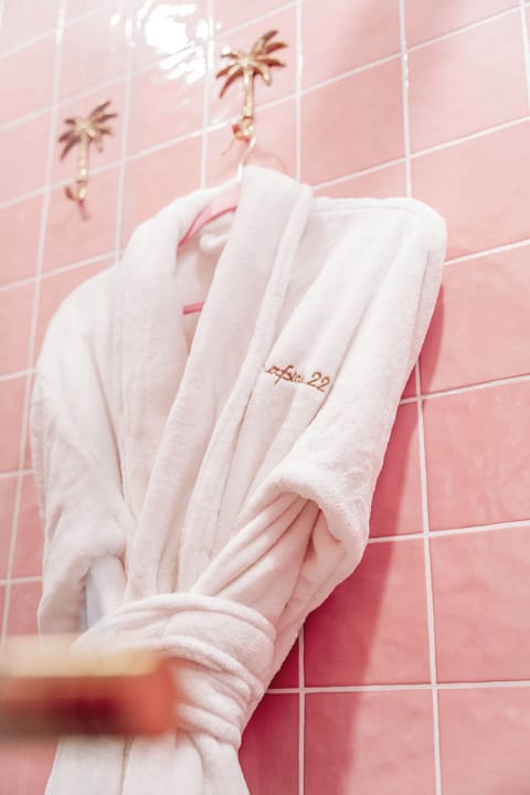 Eco-friendly toiletries, hair dryer, bathrobes, slippers