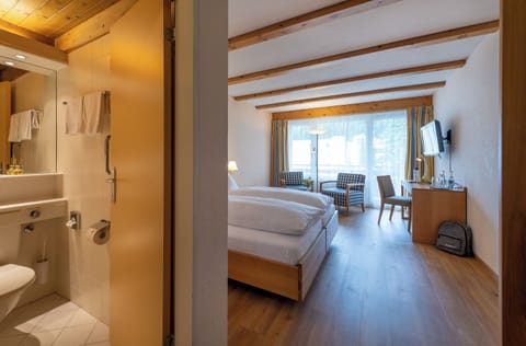 Hypo-allergenic bedding, free minibar, in-room safe, desk