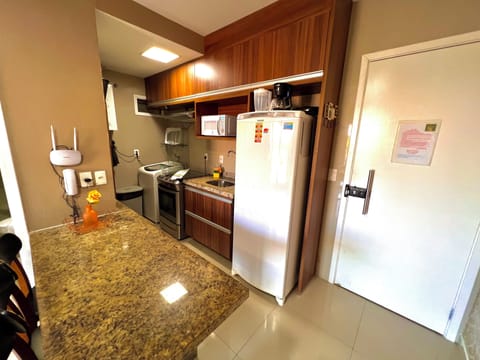 Apartment | Private kitchen | Full-size fridge, microwave, coffee/tea maker, cookware/dishes/utensils