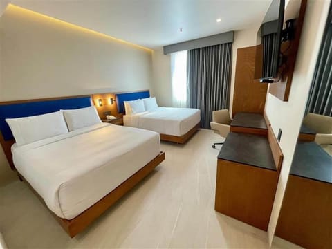 Family Room, 2 Queen Beds, Non Smoking | Iron/ironing board, bed sheets