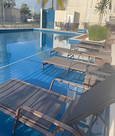 Deluxe Apartment | Pool | Indoor pool, open 9:00 AM to 10:00 PM, pool umbrellas, sun loungers