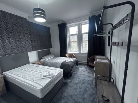 Classic Twin Room | Bathroom | Shower, hair dryer, towels, soap