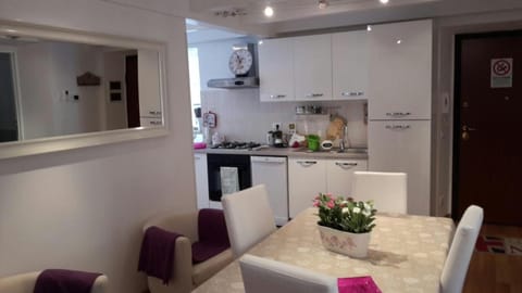 Apartment, 3 Bedrooms | Private kitchen | Full-size fridge, microwave, oven, stovetop