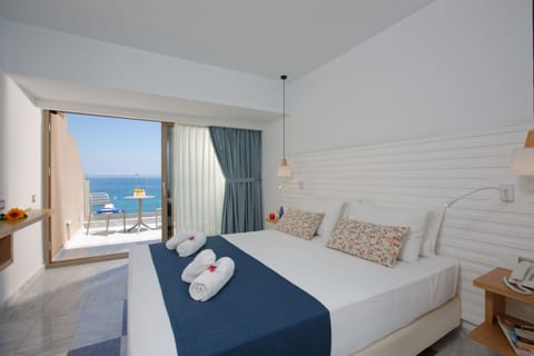Superior Studio, Sea View | In-room safe, desk, laptop workspace, blackout drapes
