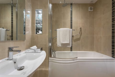 Combined shower/tub, eco-friendly toiletries, hair dryer, towels