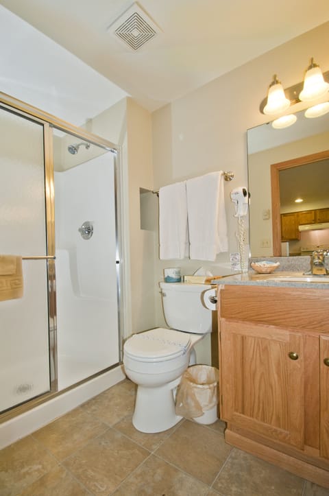 Deluxe Room, Multiple Beds | Bathroom | Hair dryer, towels