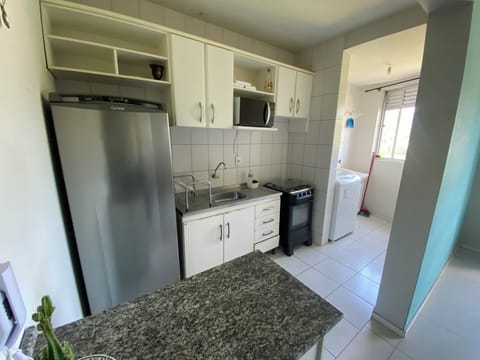 Comfort Apartment, City View | Private kitchenette | Fridge, microwave, oven, stovetop