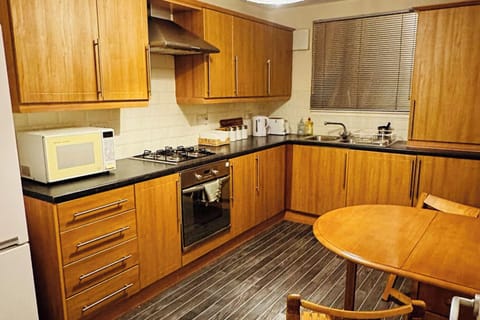 Apartment | Private kitchen | Fridge, microwave, oven, stovetop