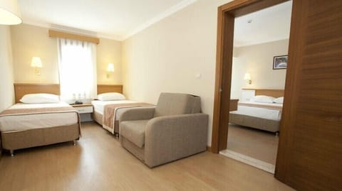 Family Double or Twin Room | Minibar, in-room safe, free rollaway beds, free WiFi