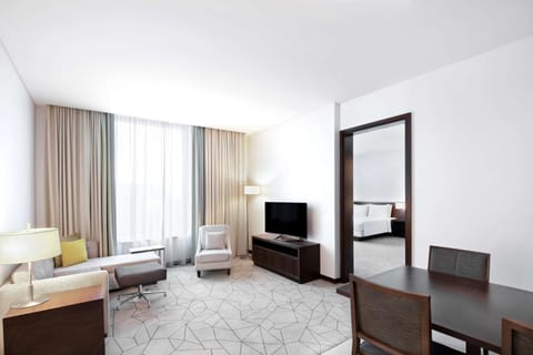 Suite, 1 King Bed with Sofa bed | Minibar, in-room safe, individually decorated, individually furnished