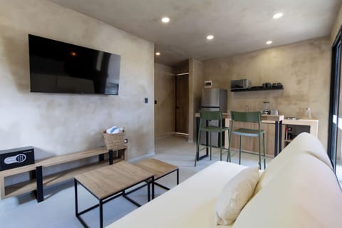 Superior Suite | Living area | 50-inch Smart TV with digital channels, streaming services