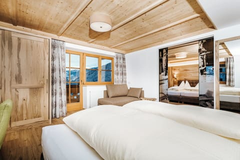 Family Room, 2 Bedrooms | Hypo-allergenic bedding, in-room safe, soundproofing, free WiFi