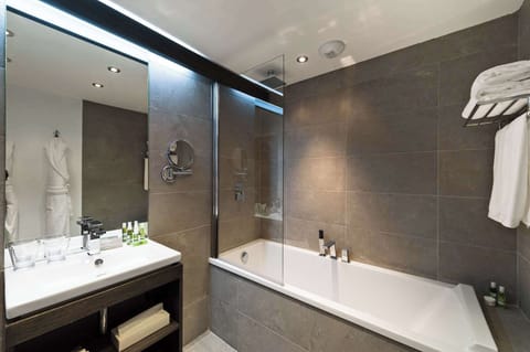 Combined shower/tub, hair dryer, towels, soap