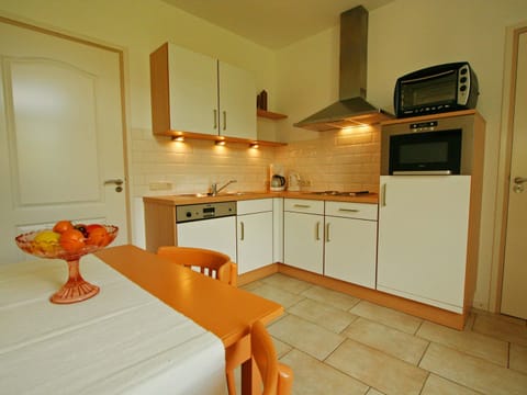Comfort House, 3 Bedrooms | Private kitchen | Microwave, oven, dishwasher, coffee/tea maker