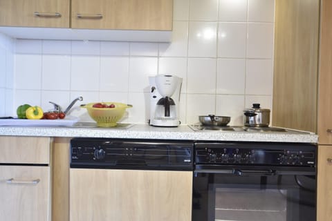 Deluxe Apartment, 3 Bedrooms | Private kitchen | Fridge, oven, dishwasher