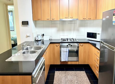 Superior Apartment, 3 Bedrooms, Non Smoking, City View | Private kitchen | Fridge, microwave, oven, stovetop