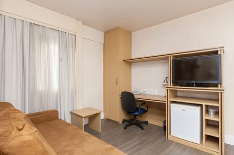 Deluxe Triple Room, City View | Laptop workspace, free WiFi