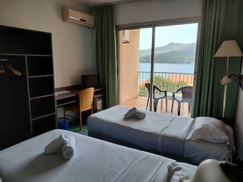 Twin Room, Sea View | Desk, rollaway beds, bed sheets