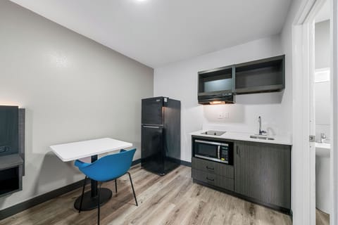 Studio, 1 Queen Bed | Private kitchen | Full-size fridge, microwave, stovetop