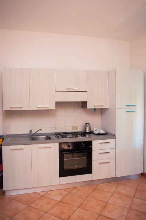 Apartment, 3 Bedrooms, Garden View (Trilocale) | Private kitchen | Fridge