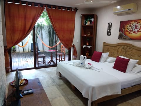 Superior Suite, 1 King Bed, Garden Area | Premium bedding, blackout drapes, iron/ironing board, free WiFi