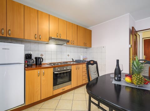 Apartment (Two Bedroom Apartment) | Private kitchen | Fridge