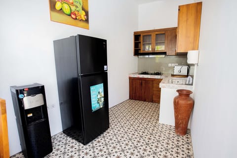 Standard Villa, Pool View | Private kitchen | Fridge, microwave, toaster, highchair