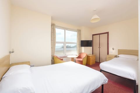 Triple Room, Sea View | Desk, iron/ironing board, free WiFi, bed sheets