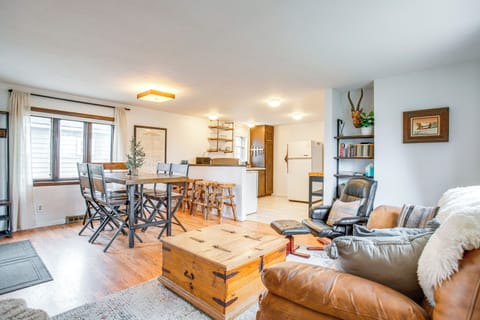 House (1 Bedroom) | Living area | Fireplace, books