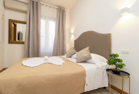Family Quadruple Room | Minibar, iron/ironing board, free WiFi