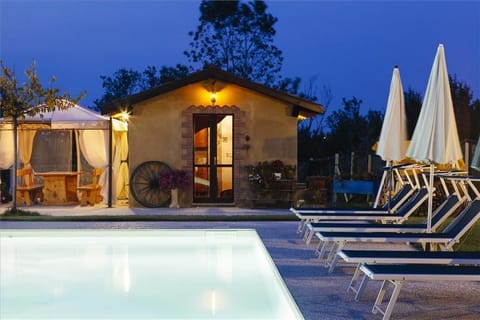 Seasonal outdoor pool, open 8:00 AM to 8:00 PM, pool umbrellas