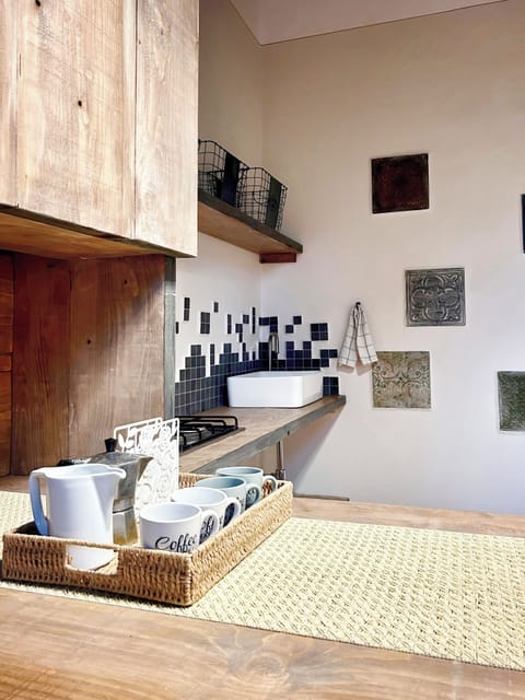 Superior Duplex, 2 Bedrooms, Mezzanine | Private kitchen | Fridge, microwave, stovetop, coffee/tea maker